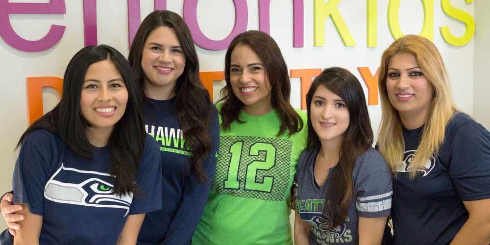 Pediatric Dentistry Staff in Seahawks Gear at Renton Kids Dentistry